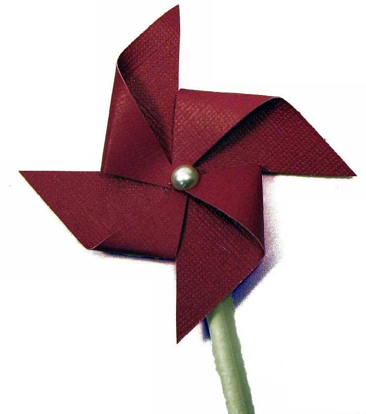 Photograph of a real pinwheel with four spokes. The pinwheel is red with a green stem and has a silver tack in the middle attaching the pinwheel to the stem.