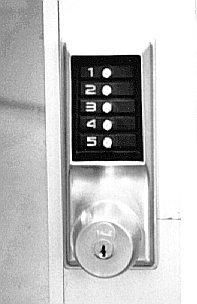an image of a Simplex lock: five buttons numbered 1–5 over a doorknob with a keyhole